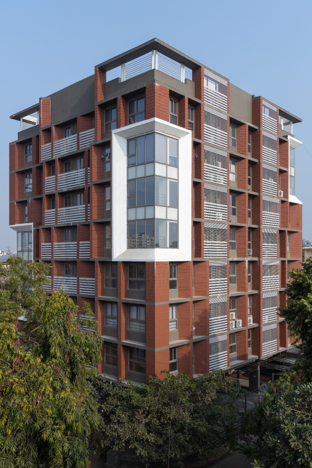 Tapas Elegance — red-brick facade and glazed bay