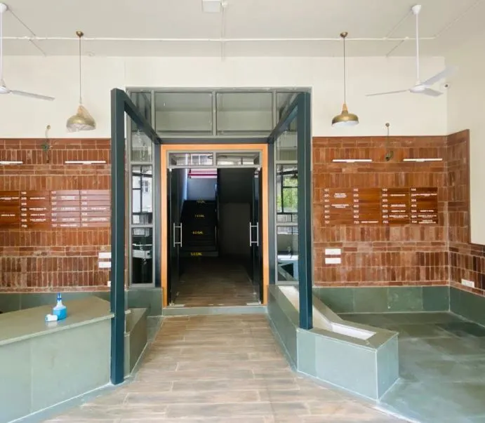 Tapas Elegance — entrance lobby with nameplate directory