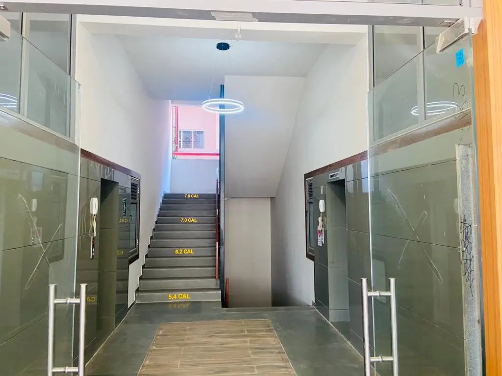 Tapas Elegance — lift lobby and staircase
